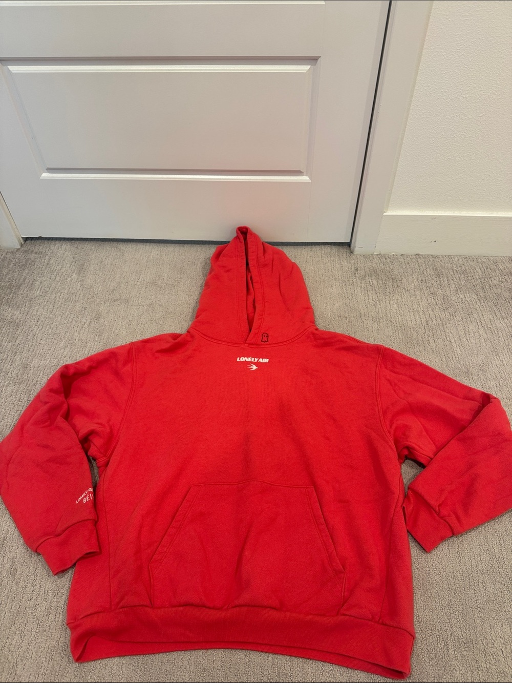 LONELY GHOST red “Text me when you land” hoodie